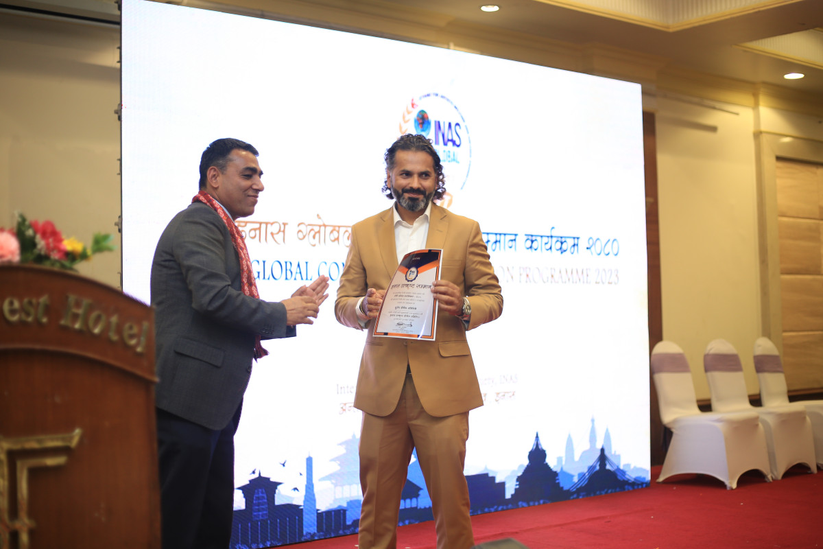 मदन र प्रकाशले ग्रहण गरे इनास उत्कृष्ट सम्मान